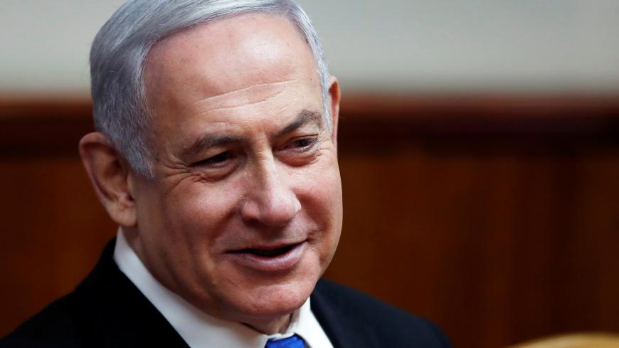 Israeli Prime Minister Benjamin Netanyahu attends the weekly cabinet meeting in Jerusalem December 8, 2019. REUTERS/Ronen Zvulun - RC2ZQD929P8U