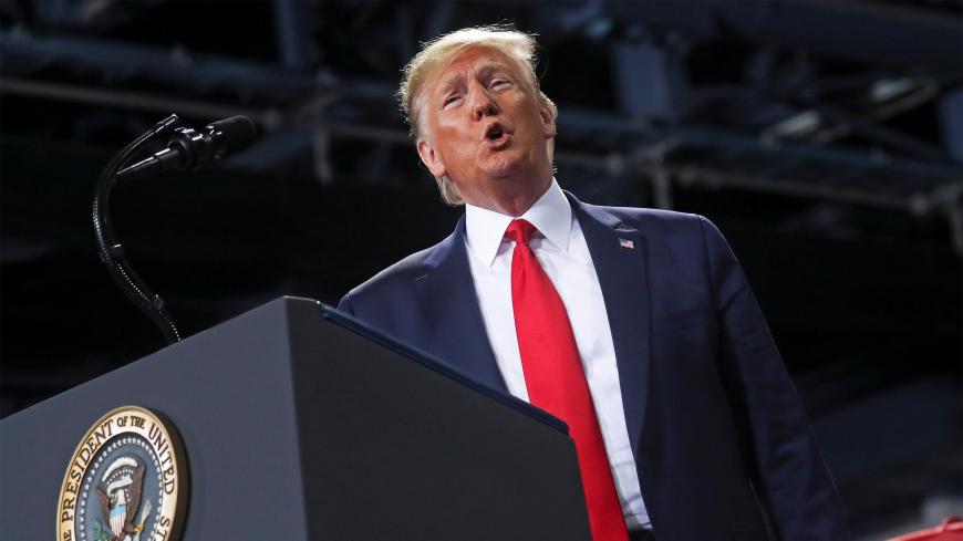 U.S. President Donald Trump speaks during a campaign rally in Battle Creek, Michigan, U.S., December 18, 2019. REUTERS/Leah Millis? - RC23YD9AE9CJ
