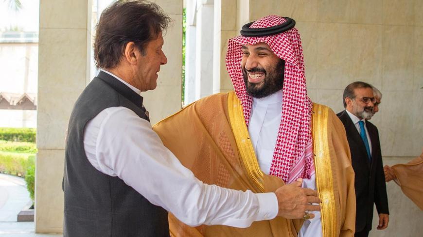 Pakistan's Prime Minister Imran Khan is welcomed by Saudi Arabia's Crown Prince Mohammed bin Salman in Jeddah, Saudi Arabia, September 19, 2019. Bandar Algaloud/Courtesy of Saudi Royal Court/Handout via REUTERS ATTENTION EDITORS - THIS IMAGE WAS PROVIDED BY A THIRD PARTY. - RC12CFCDD940
