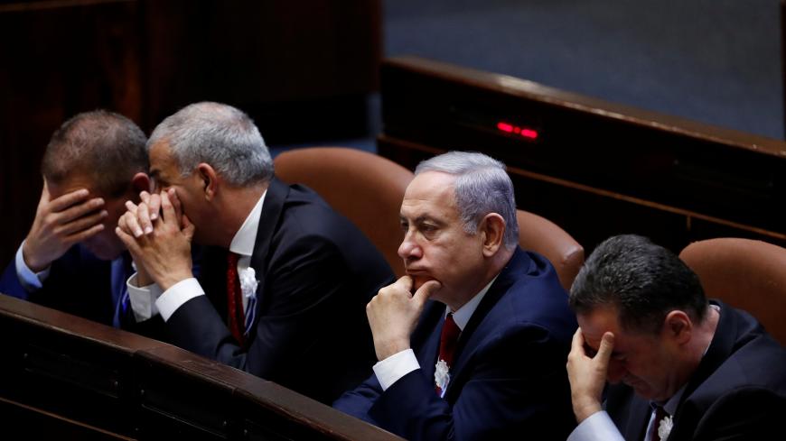 Israeli Prime Minister Benjamin Netanyahu attends the swearing-in ceremony of the 22nd Knesset, the Israeli parliament, in Jerusalem October 3, 2019. REUTERS/Ronen Zvulun - RC13F4927B00