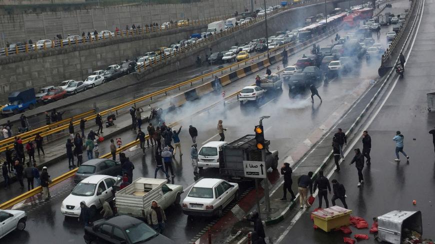 People protest against increased gas price, on a highway in Tehran, Iran November 16, 2019. Nazanin Tabatabaee/WANA (West Asia News Agency) via REUTERS ATTENTION EDITORS - THIS IMAGE HAS BEEN SUPPLIED BY A THIRD PARTY     TPX IMAGES OF THE DAY - RC2CCD9U8A39