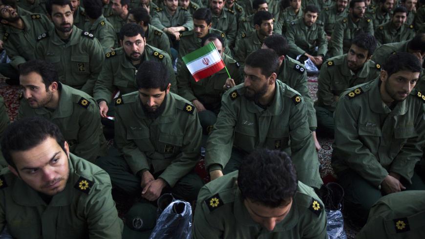 EDITORS' NOTE: Reuters and other foreign media are subject to Iranian restrictions on leaving the office to report, film or take pictures in Tehran.

Members of the revolutionary guard attend the anniversary ceremony of Iran's Islamic Revolution at the Khomeini shrine in the Behesht Zahra cemetery, south of Tehran, February 1, 2012. REUTERS/Raheb Homavandi  (IRAN - Tags: POLITICS ANNIVERSARY MILITARY) - GM1E8211G4U01