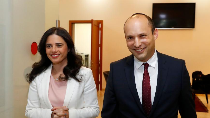 Israel's Minister of Education Naftali Bennett (R) and Israeli Justice Minister Ayelet Shaked (L) announce the formation of new political party HaYemin HeHadash or The New Right, during a press conference in the Israeli Mediterranean coastal city of Tel Aviv on December 29, 2018. (Photo by JACK GUEZ / AFP)        (Photo credit should read JACK GUEZ/AFP via Getty Images)
