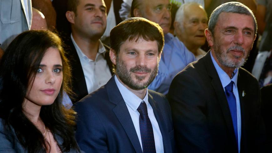 Former Israeli Justice Minister Ayelet Shaked attends the launch of the political party "Yemina", which she formed with Transportation Minister Bezalel Smotrich (C) and Education Minister Rafi Peretz (R), on August 12, 2019 in the Israeli city of Ramat Gan. (Photo by JACK GUEZ / AFP)        (Photo credit should read JACK GUEZ/AFP via Getty Images)