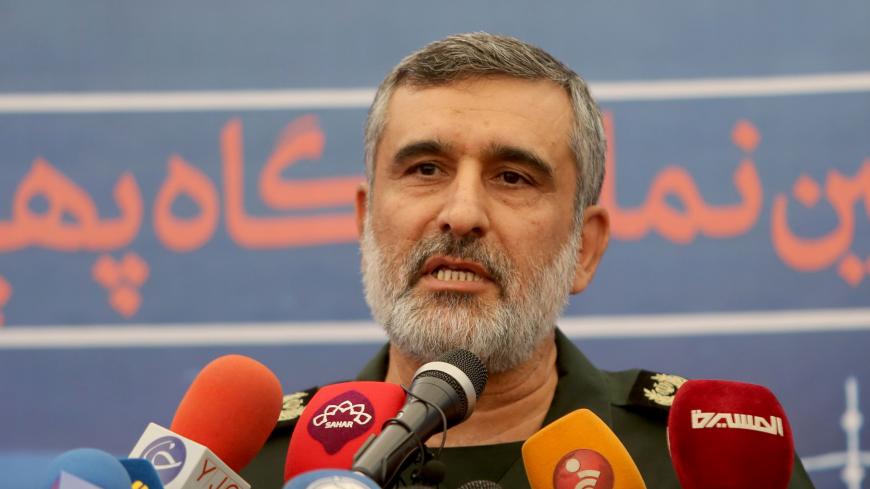 General Amir Ali Hajizadeh, the head of the Revolutionary Guard's aerospace division, speaks at Tehran's Islamic Revolution and Holy Defence museum, during the unveiling of an exhibition of what Iran says are US and other drones captured in its territory, in the capital Tehran on September 21, 2019. - Iran's Revolutionary Guards commander today warned any country that attacks the Islamic republic will see its territory become the "main battlefield" as he opened an exhibition of captured drones. (Photo by AT