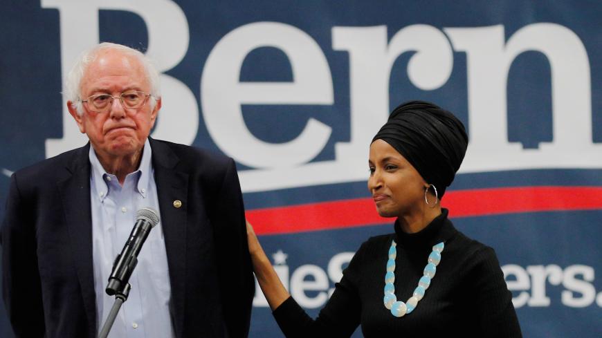 U.S. Representative Ilhan Omar (D-MN) introduces Democratic 2020 U.S. presidential candidate and U.S. Senator Bernie Sanders (I-VT) at a campaign event in Manchester, New Hampshire, U.S., December 13, 2019.   REUTERS/Brian Snyder - RC2IUD9ZZ02U
