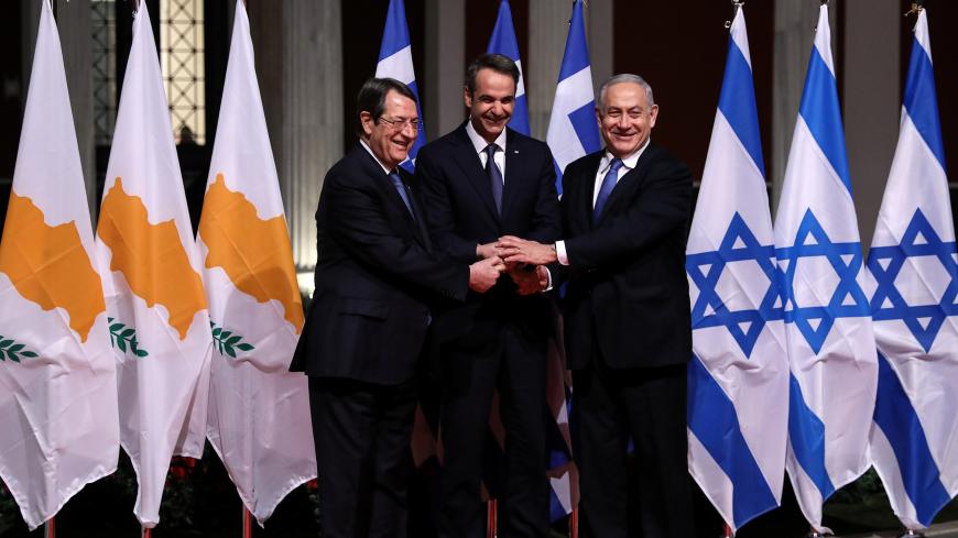 (From L to R) Cypriot President Nicos Anastasiades, Greek Prime Minister Kyriakos Mitsotakis and Israeli Prime Minister Benjamin Netanyahu pose for a photo before signing a deal to build the EastMed subsea pipeline to carry natural gas from the eastern Mediterranean to Europe, at the Zappeion Hall in Athens, Greece, January 2, 2020. REUTERS/Alkis Konstantinidis - RC2U7E9A69GD