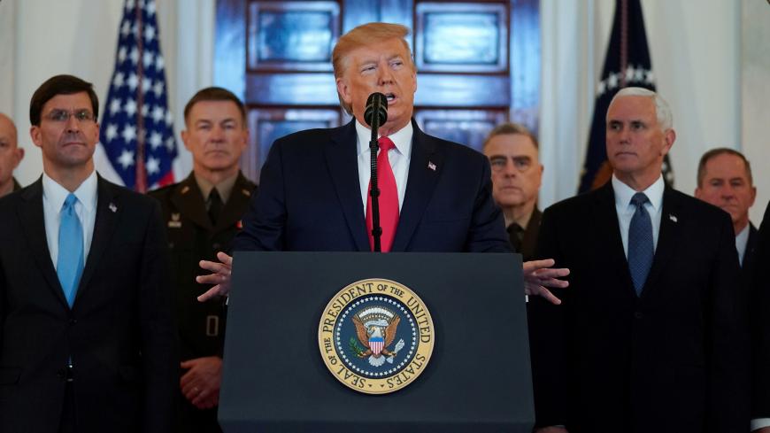 U.S. President Donald Trump delivers a statement about Iran flanked by U.S. Secretary of Defense Mark Esper, Vice President Mike Pence and military leaders in the Grand Foyer at the White House in Washington, U.S., January 8, 2020. REUTERS/Kevin Lamarque     TPX IMAGES OF THE DAY - RC2SBE92V1RE