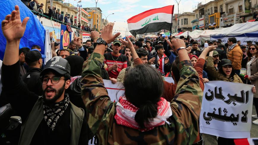 Iraqi demonstrators shout slogans during ongoing anti-government protests in Baghdad, Iraq January 10, 2020. REUTERS/Thaier al-Sudani - RC21DE9KUU0Y
