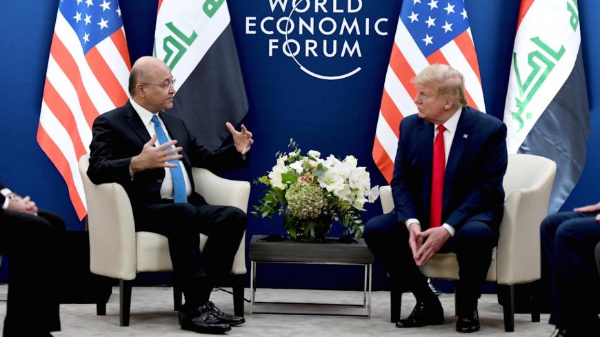 U.S. President Donald Trump meets with Iraq's President Barham Salih during the 50th World Economic Forum (WEF) annual meeting in Davos, Switzerland, January 22, 2020. The Presidency of the Republic of Iraq Office/Handout via REUTERS ATTENTION EDITORS - THIS IMAGE WAS PROVIDED BY A THIRD PARTY. - RC20LE9BTG35