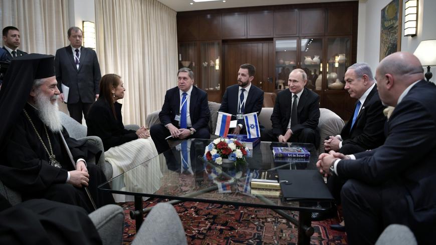 Russian President Vladimir Putin, Israeli Prime Minister Benjamin Netanyahu, Yaffa Issachar, mother of Naama Issachar who is jailed in Russia on drug charges, and officials attend a meeting in Jerusalem, January 23, 2020. Sputnik/Alexei Nikolskyi/Kremlin via REUTERS  ATTENTION EDITORS - THIS IMAGE WAS PROVIDED BY A THIRD PARTY. - RC2MLE9IX6KG