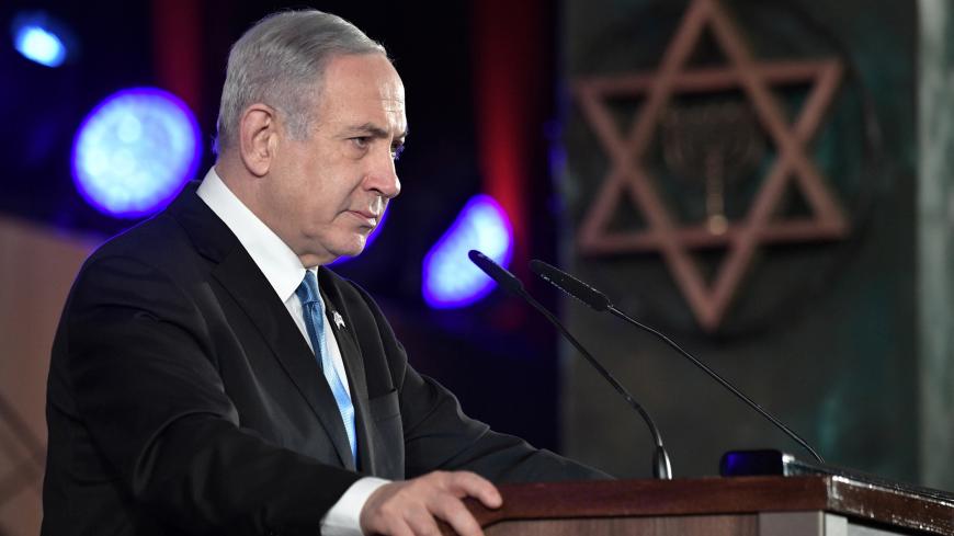 Israeli Prime Minister Benjamin Netanyahu delivers a speech during a ceremony to inaugurate a memorial commemorating citizens and defenders of Leningrad under siege during World War Two in Jerusalem, January 23, 2020. Sputnik/Alexei Nikolskyi/Kremlin via REUTERS  ATTENTION EDITORS - THIS IMAGE WAS PROVIDED BY A THIRD PARTY. - RC2OLE9HQ3UJ