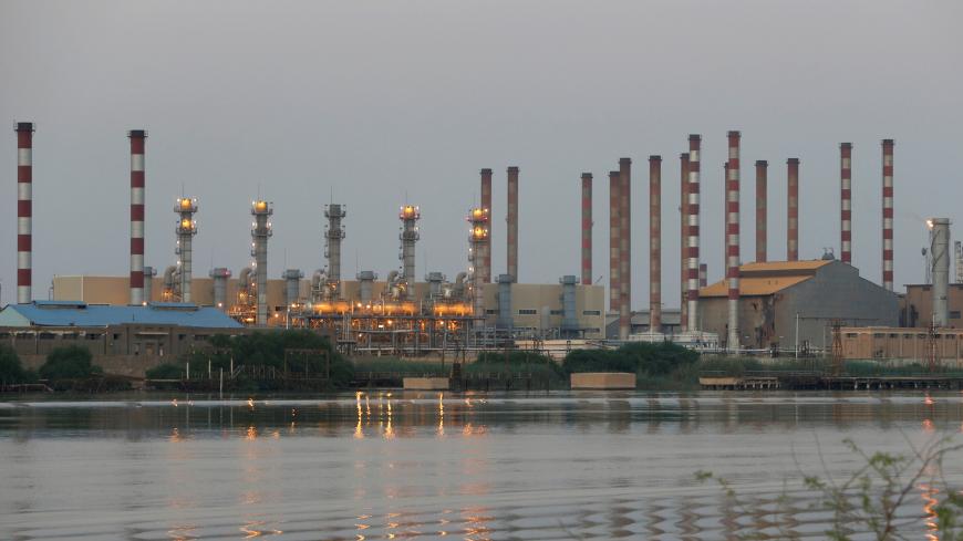 A general view of Abadan oil refinery in southwest Iran, is pictured from Iraqi side of Shatt al-Arab in Al-Faw south of Basra, Iraq September 21, 2019. REUTERS/Essam Al-Sudani - RC156ACB6840