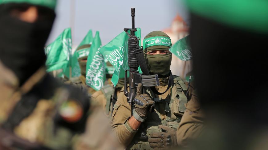 Palestinian Hamas militants take part in an anti-Israel military show in the southern Gaza Strip November 11, 2019. REUTERS/Ibraheem Abu Mustafa - RC2Z8D99U0S8