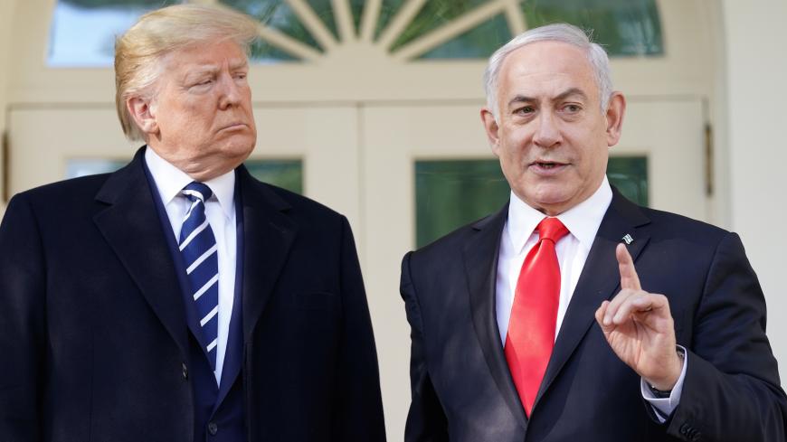 U.S. President Donald Trump listens as he welcomes Israel's Prime Minister Benjamin Netanyahu at the White House in Washington, U.S., January 27, 2020. REUTERS/Kevin Lamarque - RC2GOE9UL51N