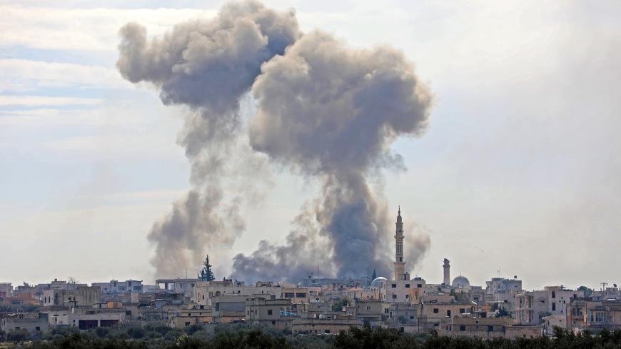 This picture taken on February 3, 2020 shows smoke plumes billowing in the Syrian village of al-Nayrab, about 14 kilometres southeast of the city of Idlib in the northwestern Idlib province, during bombardment by Syrian government forces and its allies. (Photo by Omar HAJ KADOUR / AFP) (Photo by OMAR HAJ KADOUR/AFP via Getty Images)