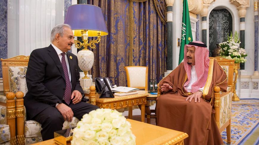 Saudi Arabia's King Salman bin Abdulaziz meets with Libyan military commander Khalifa Haftar in Riyadh, Saudi Arabia March 27, 2019. Bandar Algaloud/Courtesy of Saudi Royal Court/Handout via REUTERS ATTENTION EDITORS - THIS PICTURE WAS PROVIDED BY A THIRD PARTY. - RC1909E0CC40