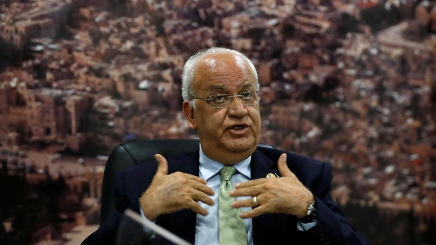 Chief Palestinian Negotiator Saeb Erekat gestures as he speaks to the media in Ramallah, in the Israeli-occupied West Bank July 1, 2019. Picture taken July 1, 2019. REUTERS/Mohamad Torokman - RC18AC22D710