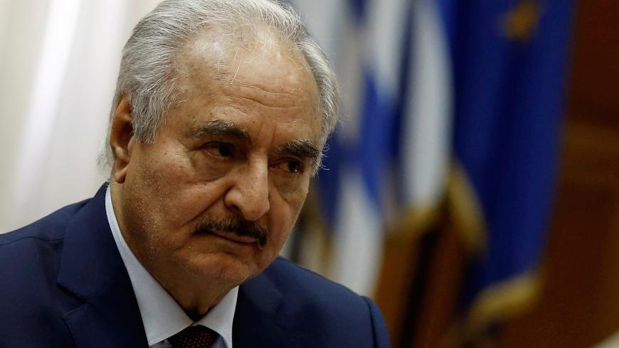 Libyan commander Khalifa Haftar meets Greek Prime Minister Kyriakos Mitsotakis (not pictured) at the Parliament in Athens, Greece, January 17, 2020. REUTERS/Costas Baltas - RC2NHE9O9B9H