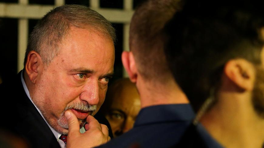 FILE PHOTO: Avigdor Lieberman, leader of Yisrael Beitenu leaves his party headquarters following the announcement of exit polls in Israel's parliamentary election, in Jerusalem September 18, 2019. REUTERS/Oren Ben Hakoon/File Photo. ISRAEL OUT. NO COMMERCIAL OR EDITORIAL SALES IN ISRAEL - RC12937027A0