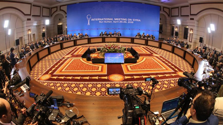 A picture taken on April 26, 2019 shows a general view of the hall where the Syrian constitutional committee takes place in Nur-Sultan, Kazakhstan. - Two-day talks on Syria backed by Iran, Russia and Turkey concluded in Kazakhstan on April 26, 2019 without notable progress on forming a constitutional committee to drive a political settlement in the war-wracked country. (Photo by Alexey FILIPPOV / AFP)        (Photo credit should read ALEXEY FILIPPOV/AFP via Getty Images)