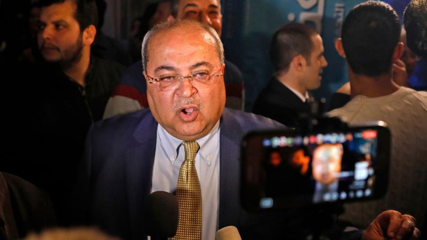 Ahmed Tibi, leader of the Arab Movement for Change (Ta'al) party that is part of the Joint List alliance, speaks to reporters at their electoral headquarters in Israel's northern city of Shefa-Amr on March 2, 2020, after polls officially closed. - Israeli Prime Minister Benjamin Netanyahu appeared to lead his main challenger following elections with multiple exit polls putting his right-wing Likud several seats ahead of the centrist Blue and White party. Exit polls by three Israeli television networks, rele