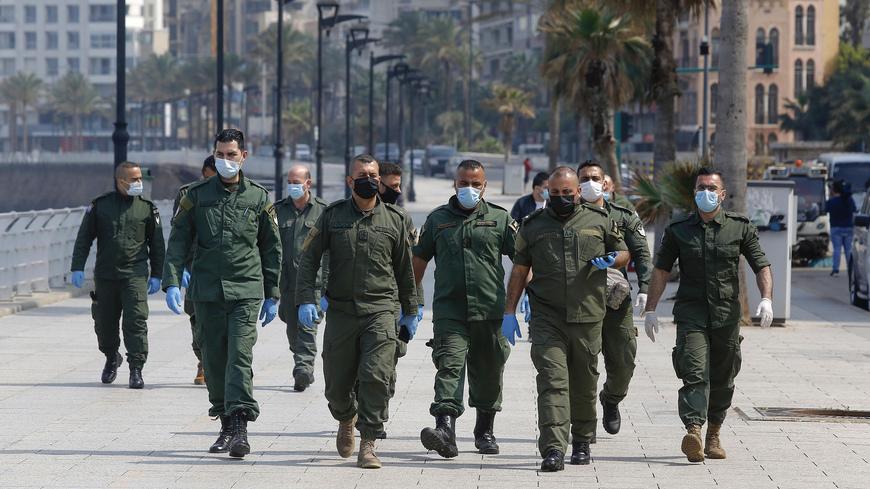 BEIRUT, March 16, 2020 -- Police are seen on the street in Beirut, Lebanon, March 16, 2020. The number of COVID-19 cases in Lebanon increased on Monday to 109, the National News Agency reported. 
   Lebanon's Prime Minister Hassan Diab announced on Sunday general mobilization until March 29 to restrict the spread of the virus. (Photo by Bilal Jawich/Xinhua via Getty) (Xinhua/Li Liangyong via Getty Images)