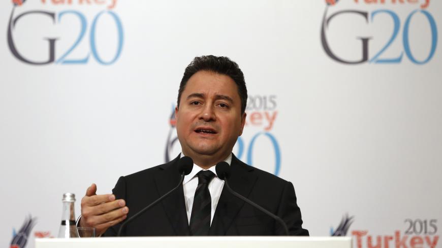 Turkey's Deputy Prime Minister Ali Babacan speaks during a news conference during the G20 finance ministers and central bank governors meeting in Istanbul February 9, 2015. Turkey prefers to set specific national investment targets as part of efforts to boost economic growth but it is not clear if all G20 member nations are willing to sign up to hard numbers, Babacan said on Monday. REUTERS/Murad Sezer (TURKEY  - Tags: POLITICS BUSINESS) - GM1EB291GYW01