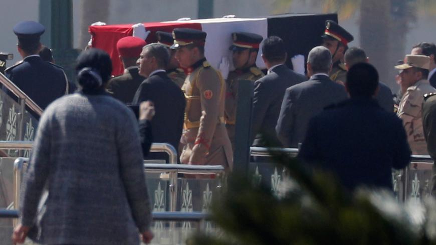 Guards carry the coffin of former Egyptian President Hosni Mubarak at Field Marshal Mohammed Hussein Tantawi Mosque, during his funeral east of Cairo, Egypt February 26, 2020. REUTERS/Amr Abdallah Dalsh - RC2A8F9FR5RW