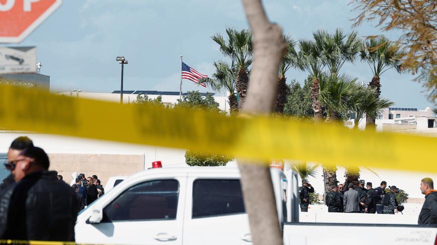 Police officers are pictured at the site of a suicide attack near the U.S. embassy in Tunis, Tunisia March 6, 2020. REUTERS/Zoubeir Souissi - RC2FEF9ZC9G8