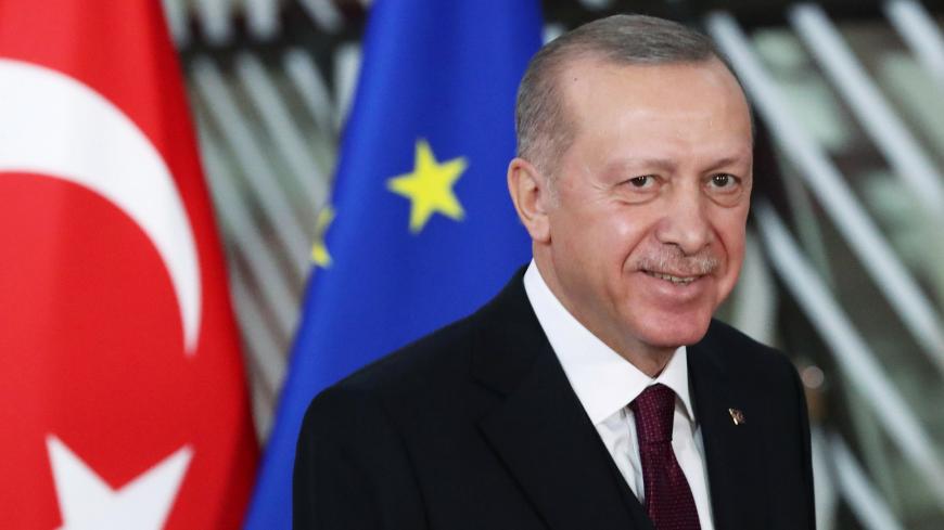 Turkish President Tayyip Erdogan reacts ahead of a meeting with EU Council President Charles Michel pose in Brussels, Belgium March 9, 2020. REUTERS/Yves Herman - RC2HGF9LYPKR