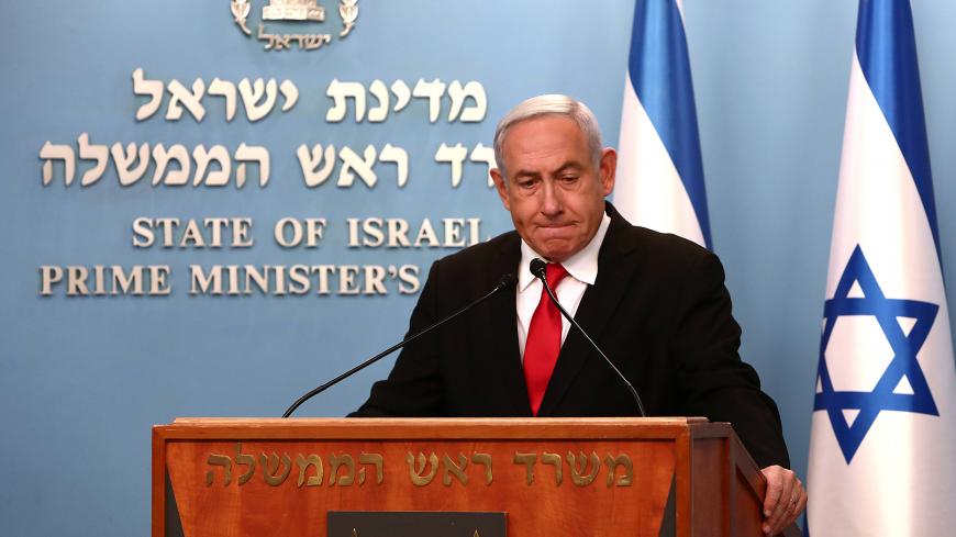 Israeli Prime Minister Benjamin Netanyahu delivers a speech at his Jerusalem office, regarding the new measures that will be taken to fight the coronavirus, March 14, 2020. Gali Tibbon/Pool via REUTERS - RC2WJF9YZ20U