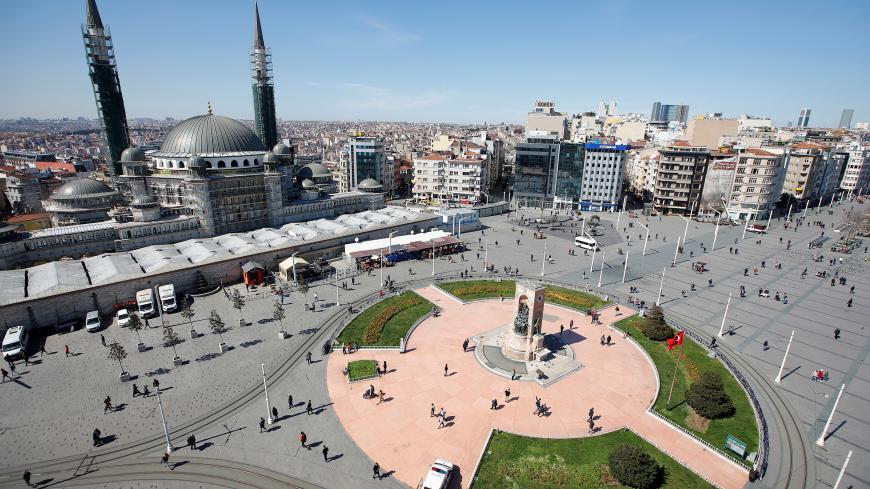 Nearly deserted Taksim square due to coronavirus disease (COVID-19) concerns is pictured in central Istanbul, Turkey, March 17, 2020. REUTERS/Kemal Aslan - RC2VLF9WF0CI