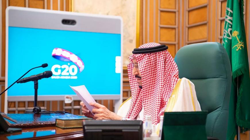 Saudi King Salman bin Abdulaziz speaks via video link during a virtual G20 summit on coronavirus disease (COVID-19), in Riyadh, Saudi Arabia March 26, 2020. Bandar Algaloud/Courtesy of Saudi Royal Court/Handout via REUTERS ATTENTION EDITORS - THIS PICTURE WAS PROVIDED BY A THIRD PARTY. - RC2PRF9ANFVP