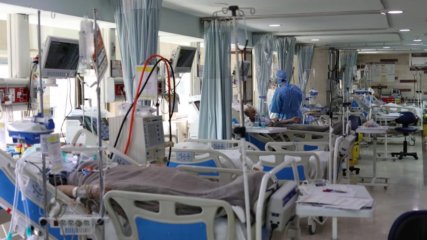 Patients with coronavirus disease (COVID-19) lie in beds at the ICU of Sasan Hospital, in Tehran, Iran March 30, 2020. WANA (West Asia News Agency)/Ali Khara via REUTERS ATTENTION EDITORS - THIS PICTURE WAS PROVIDED BY A THIRD PARTY - RC2GUF9M2YGL