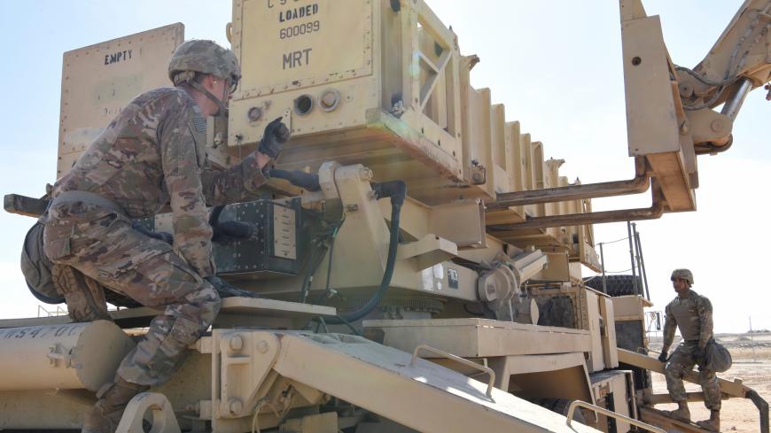 Specialist Tevin Howe and Specialist Eduardo Martinez take part in training on a U.S. Army Patriot surface-to-air missile launcher at Al Dhafra Air Base, United Arab Emirates, January 12, 2019. Picture taken January 12, 2019.  U.S. Air Force/Tech. Sgt. Darnell T. Cannady/Handout via REUTERS.  ATTENTION EDITORS - THIS IMAGE WAS PROVIDED BY A THIRD PARTY - RC1CE04C3590