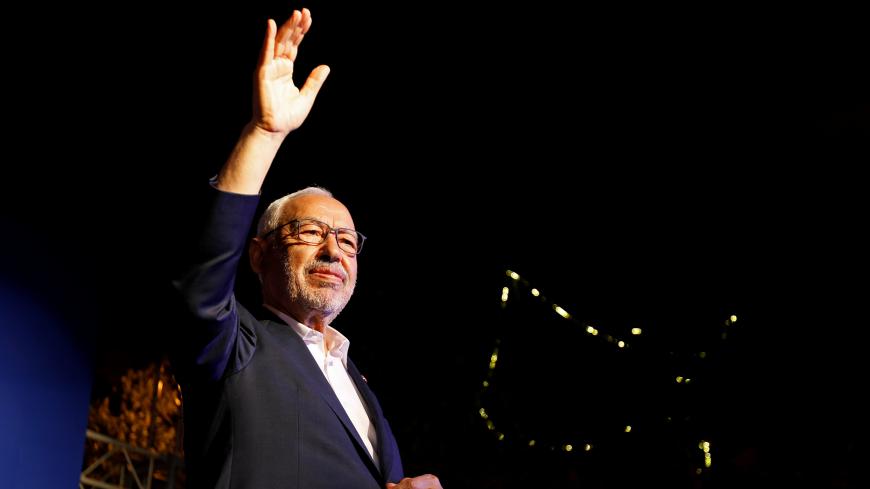 Rached Ghannouchi, leader of Tunisia's moderate Islamist Ennahda party, greets his supporters during a campaign event ahead of the parliamentary elections in Tunis, Tunisia October 3, 2019. Picture taken October 3, 2019. REUTERS/Zoubeir Souissi - RC1EF9226400
