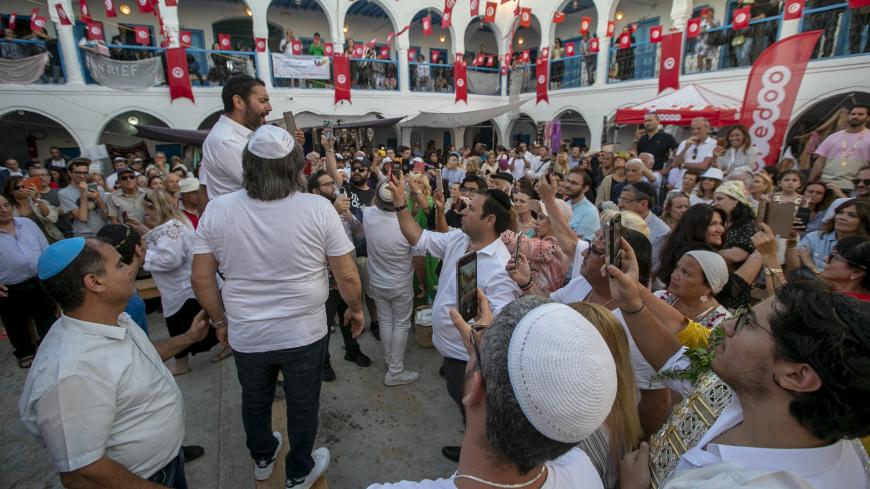 DJERBA, TUNISIA - MAY 23: Jewish pilgrims participate in an annual Jewish pilgrimage at the El Ghriba Synagogue, the oldest Jewish monument built in Africa, in Djerba, Tunisia on May 23, 2019. (Photo by Yassine Gaidi/Anadolu Agency/Getty Images)