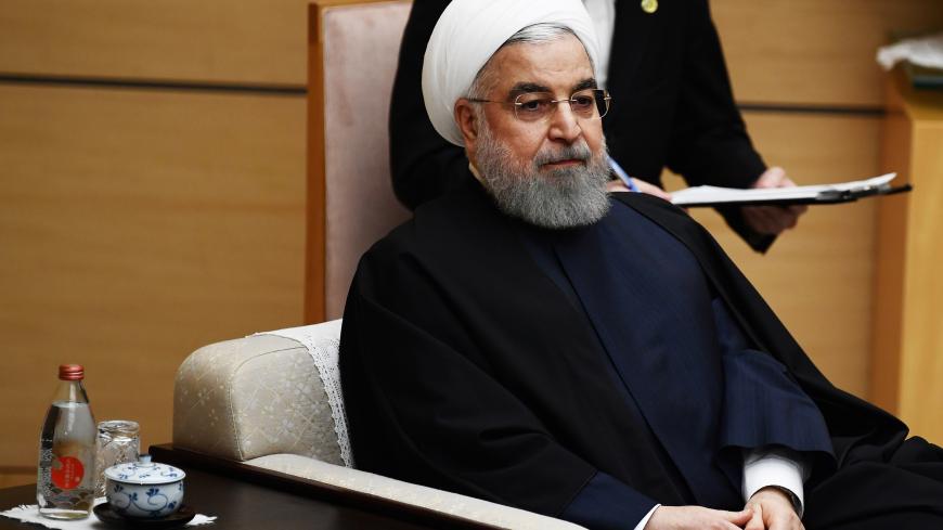 Iranian President Hassan Rouhani meets Japanese Prime Minister Shinzo Abe (not pictured) in Tokyo, Japan, December 20, 2019. Charly Triballeau/Pool via REUTERS - RC2YYD9DLX7A