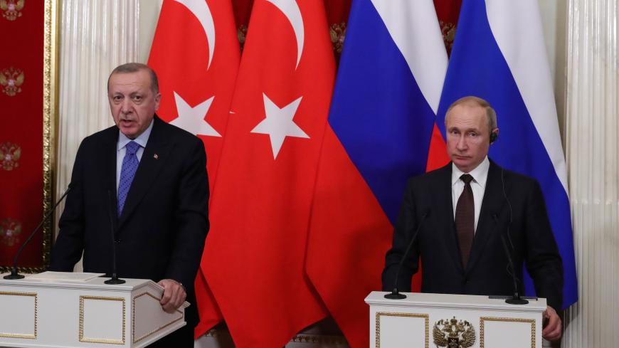 Russian President Vladimir Putin and Turkish President Tayyip Erdogan attend a news conference following their talks in Moscow, Russia March 5, 2020. Sputnik/Mikhail Klimentyev/Kremlin via REUTERS ATTENTION EDITORS - THIS IMAGE WAS PROVIDED BY A THIRD PARTY. - RC2UDF9MRZQ9