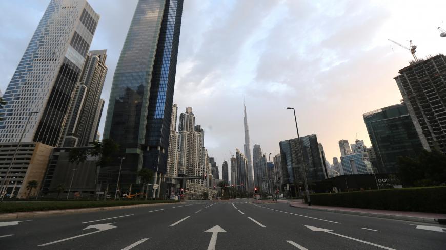A general view of Business Bay area, after a curfew was imposed to prevent the spread of the coronavirus disease (COVID-19), in Dubai, United Arab Emirates, March 28, 2020. REUTERS/Satish Kumar - RC2VSF94JGLQ