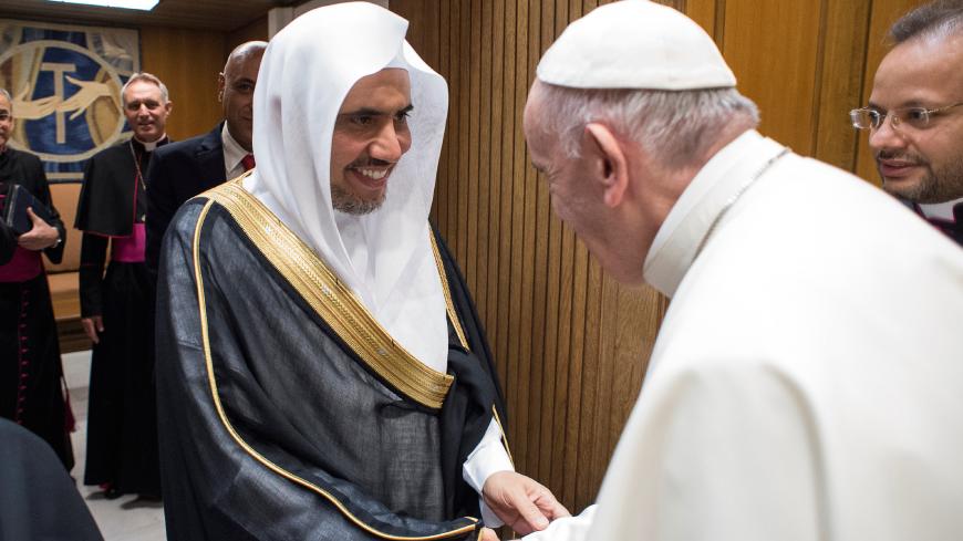 Pope Francis greets Mohammad bin Abdul Karim Al-Issa, Secretary General of the Muslim World League, during a meeting at the Vatican, September 20, 2017. Osservatore Romano/Handout via REUTERS   ATTENTION EDITORS - THIS IMAGE WAS PROVIDED BY A THIRD PARTY. NO RESALES. - RC168FEBB020