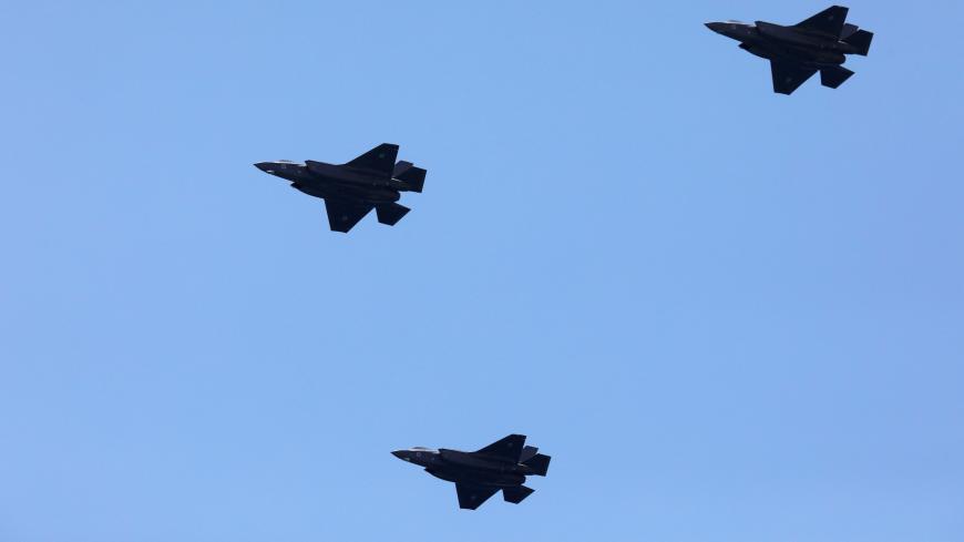 Israeli Air Force F-35 fighter jets fly over the Mediterranean Sea during an aerial show as part of the celebrations for Israel's Independence Day marking the 70th anniversary of the creation of the state, in Tel Aviv, Israel April 19, 2018. REUTERS/Amir Cohen - RC1DFEAD98C0