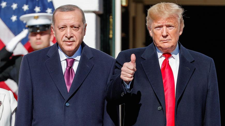 U.S. President Donald Trump welcomes Turkey's President Tayyip Erdogan at the White House in Washington, U.S., November 13, 2019. REUTERS/Tom Brenner     TPX IMAGES OF THE DAY - RC2HAD9SK03C