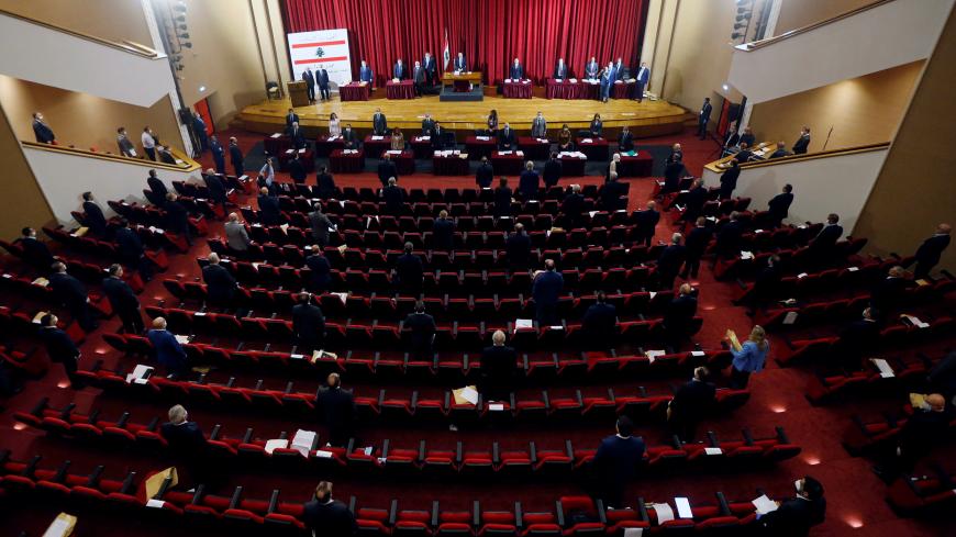 Lebanese members of Parliament attend a legislative session in a theatre hall to allow social distancing amid spread of the coronavirus disease (COVID-19), in UNESCO Palace building in Beirut, Lebanon April 21, 2020. REUTERS/Mohamed Azakir - RC2Y8G9Q09EO