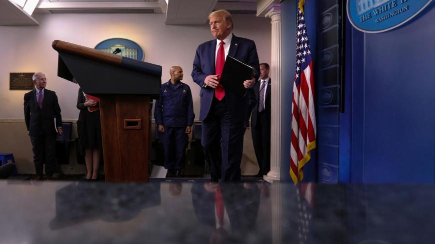 U.S. President Donald Trump arrives to address the daily coronavirus task force briefing at the White House in Washington, U.S., April 22, 2020. REUTERS/Jonathan Ernst - RC20AG905752