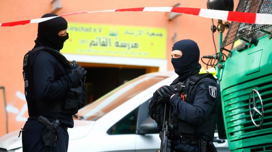German special police talk near the El-Irschad (Al-Iraschad e.V.) centre in Berlin, Germany, April 30, 2020, after Germany has banned Iran-backed Hezbollah on its soil and designated it a terrorist organisation.    REUTERS/Hannibal Hanschke - RC2UEG9F1PDQ