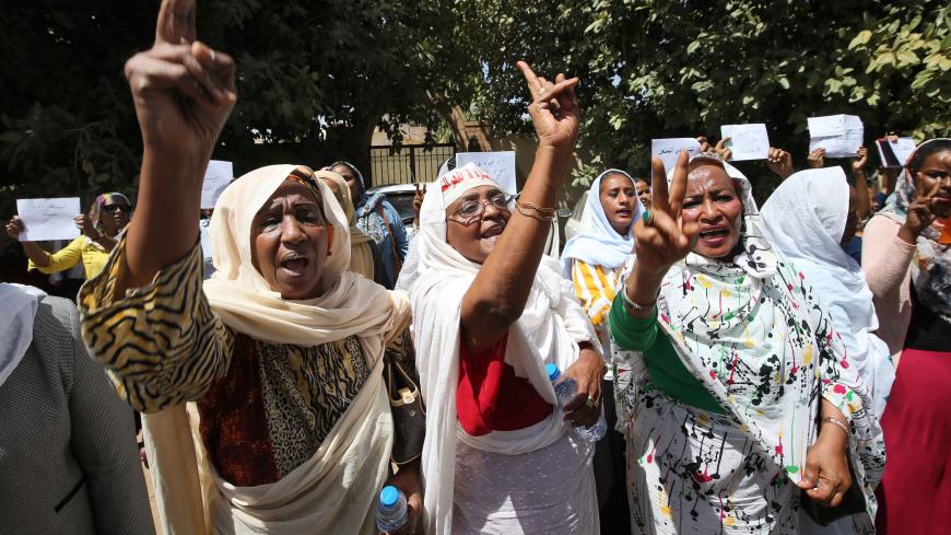 Women chant slogans during a demonstration calling for the repeal of family law in Sudan, on the occasion of International Women's Day, outside the Justice Ministry headquarters in the capital Khartoum on March 8, 2020. - Under ousted president Omar al-Bashir's Islamist regime, a notorious "public order" law was used to have women publicly flogged or imprisoned for "indecent" dress or for drinking alcohol, seen as "indecent and immoral acts". Sudan's new government last November revoked the legislation -- b