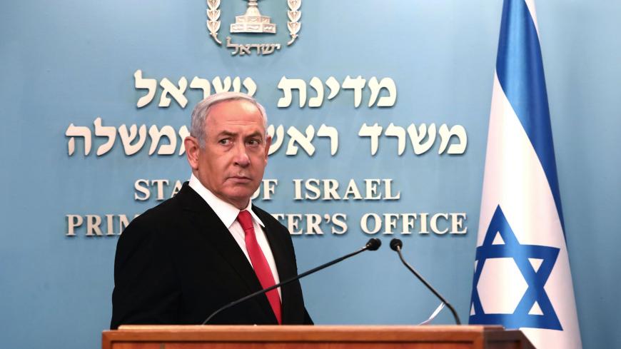 Israeli Prime Minister Benjamin Netanyahu delivers an speech at his Jerusalem office on March 14, 2020, regarding the new measures that will be taken to fight the Corona virus in Israel. - Netanyahu said Israel would shut down eateries, shopping centres and gyms in a bid to halt the spread of coronavirus. Netanyahu also said he would ask the government's approval in the upcoming cabinet meeting set to be held via video conference to allow "technologies used in the war against terror" to be used to track the