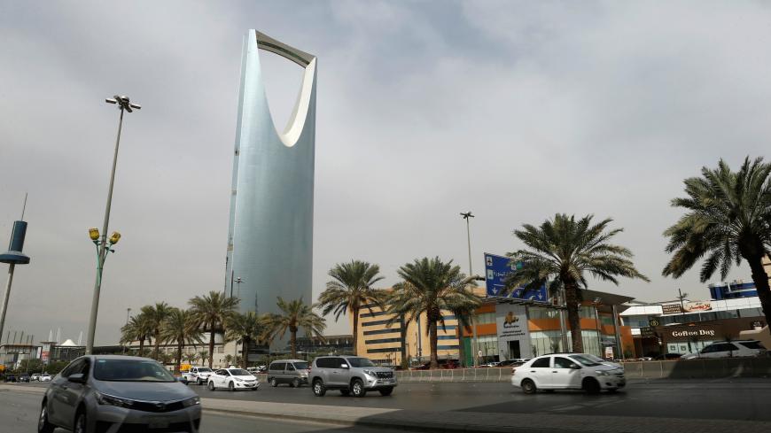 Cars drive past the Kingdom Centre Tower in Riyadh, Saudi Arabia, January 30, 2018. REUTERS/Faisal Al Nasser - RC1B1C180720